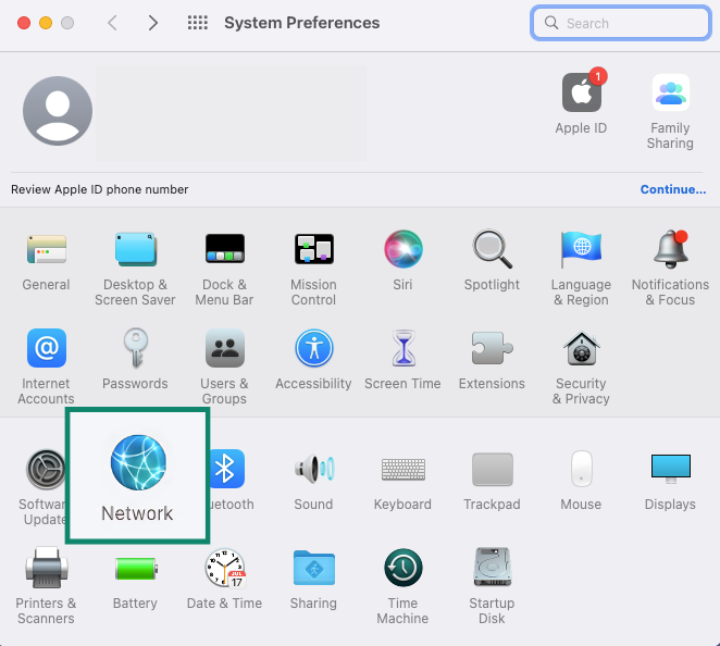 The System Preferences menu, showing the Network option.