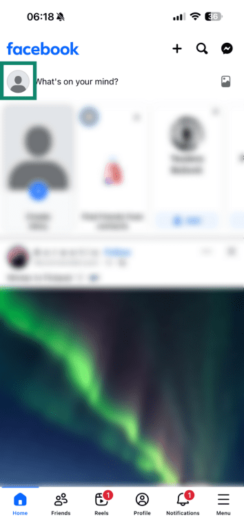 The main Facebook mobile screen with the profile icon highlighted.