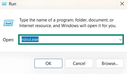 The Windows 11 Run utility. "rstrui.exe" is typed into the "Open" field.